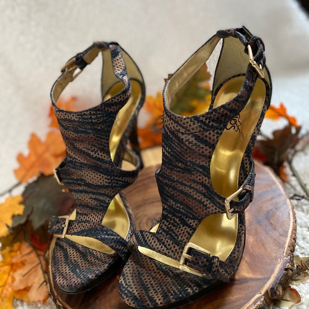 Brown and black leather heels